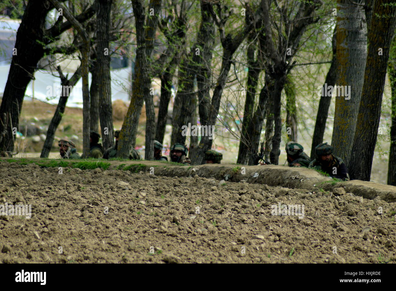 Srinagar, Kashmir. 28th Mar, 2017. Three civilians were killed and 17 others injured on Tuesday during an encounter between security forces and militant Rebal in Chadoora area of central Kashmir's Budgam district. The civilians died during clashes with security personnel at the site of the encounter. Credit: PACIFIC PRESS/Alamy Live News Stock Photo