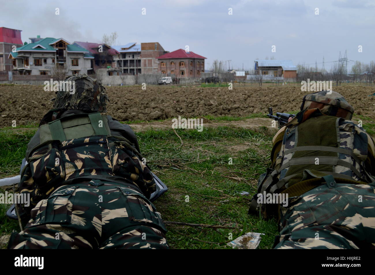 Srinagar, Kashmir. 28th Mar, 2017. Three civilians were killed and 17 others injured on Tuesday during an encounter between security forces and militant Rebal in Chadoora area of central Kashmir's Budgam district. The civilians died during clashes with security personnel at the site of the encounter. Credit: PACIFIC PRESS/Alamy Live News Stock Photo
