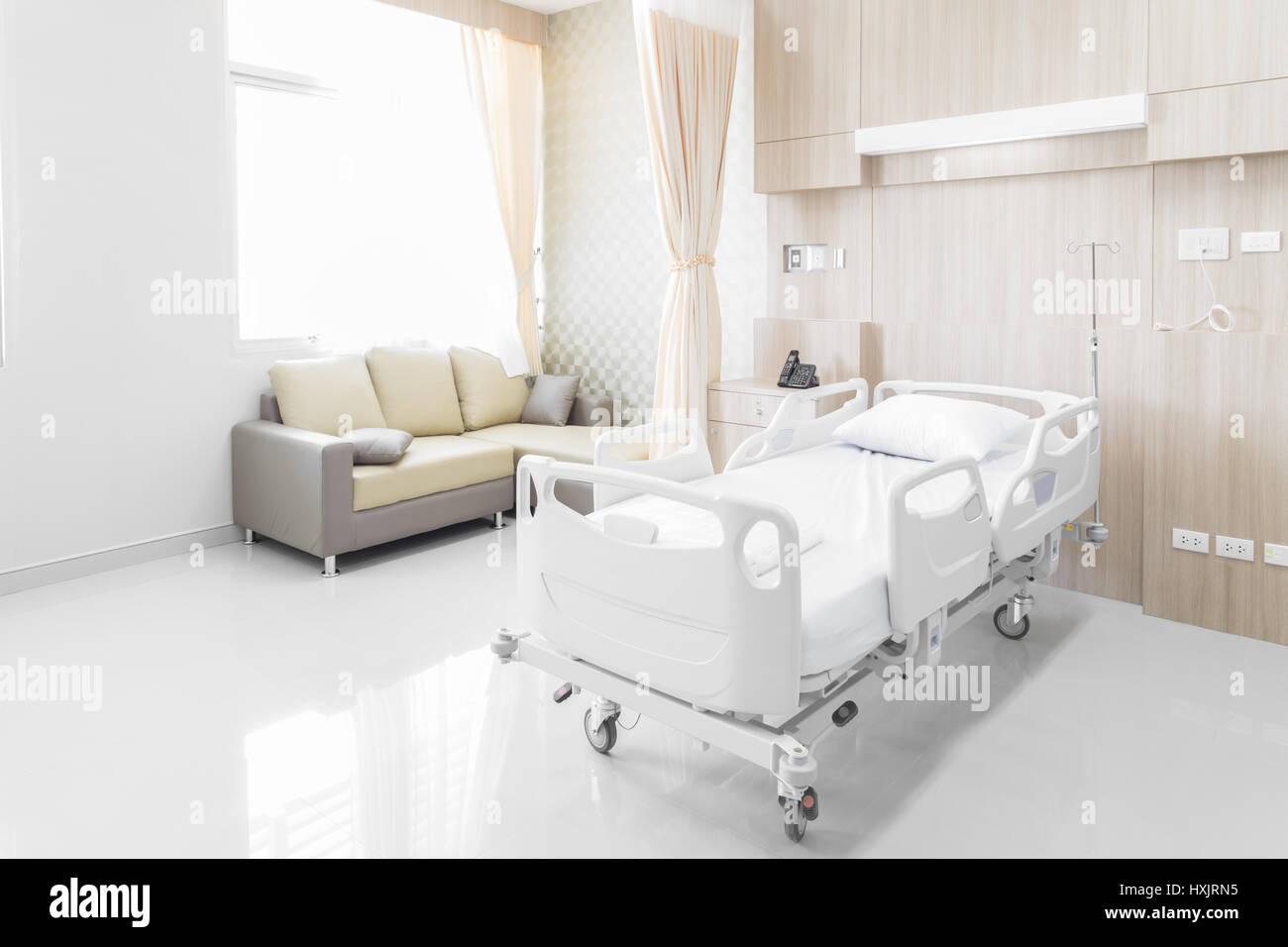 Hospital room with beds and comfortable medical equipped in a modern