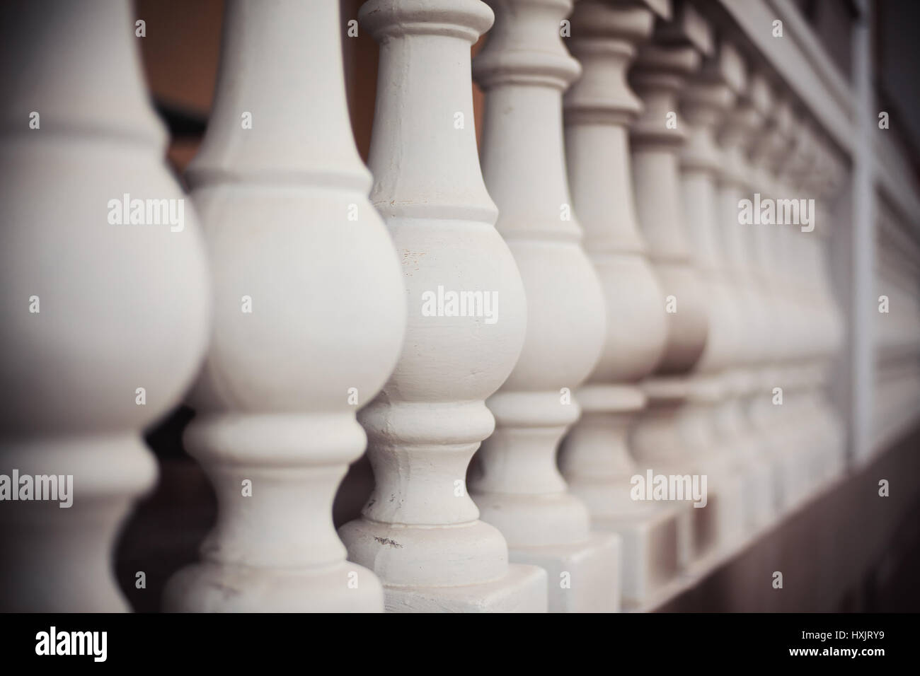 Decorative Pillars Of A White Concrete Fence Stock Photo
