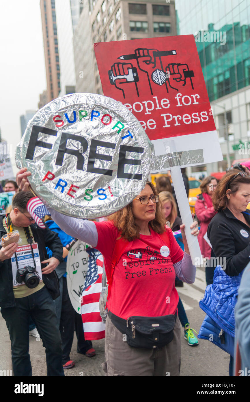 Activists rally in Bryant Park in New York prior to marching to the New ...