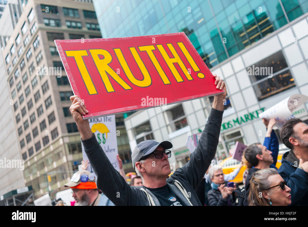 Activists rally in Bryant Park in New York prior to marching to the New York Times building in midtown Manhattan on Saturday, March 25, 2017. The rally was in response to President Donald Trump and his administration's war on the media. (© Richard B. Levine) Stock Photo