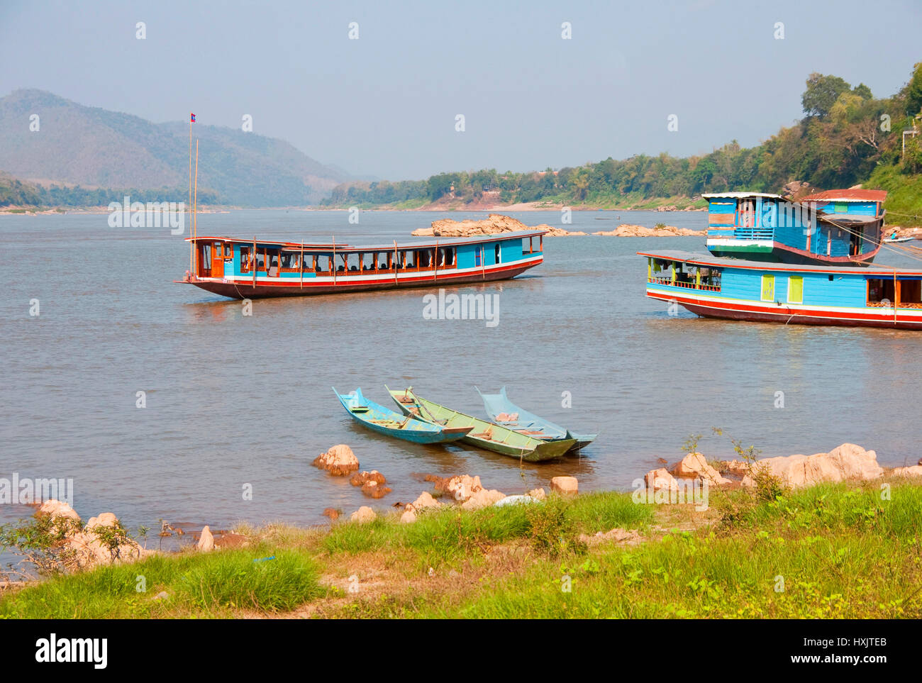Boats on Mekong River near Luang Prabang, Laos. Stock Photo