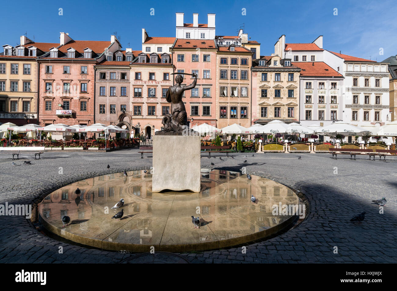 The Mermaid, symbol and patron of the city of Warsaw is embraced in the City Coat of Arms. The statue is  in the centre of the Warsaw's Old Town Marke Stock Photo