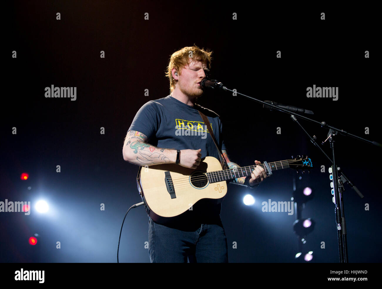 Ed Sheeran performing live on stage