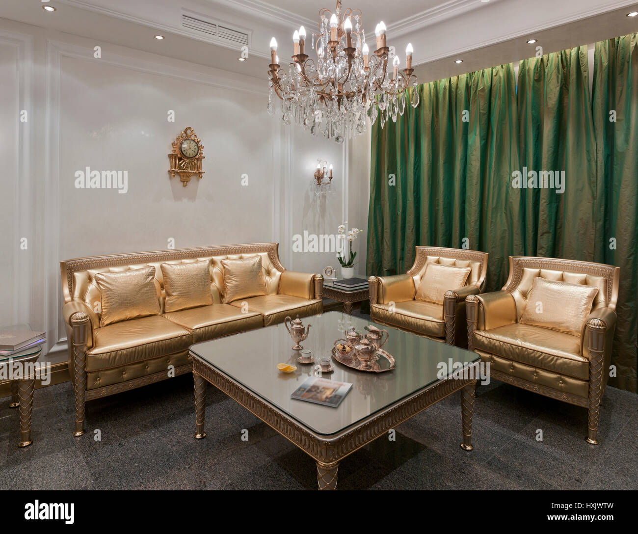 Show-room luxury interior in Moscow in a classic style with a gold furniture Stock Photo