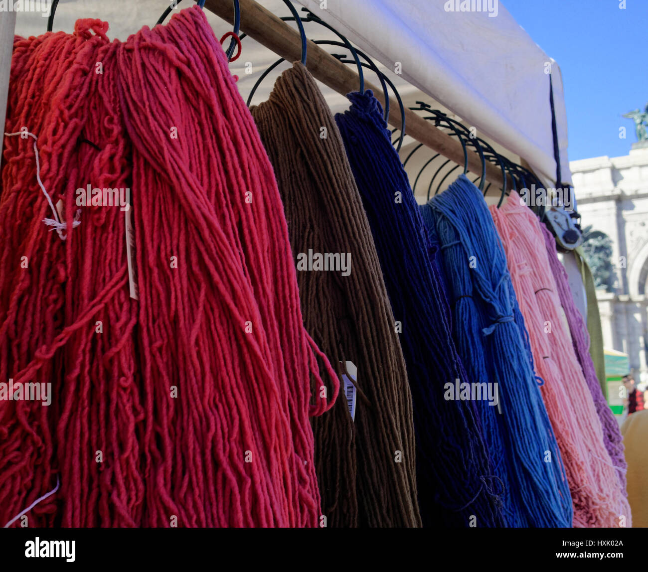 Hand dyed wool at the farmer's market in vibrant colors. Stock Photo