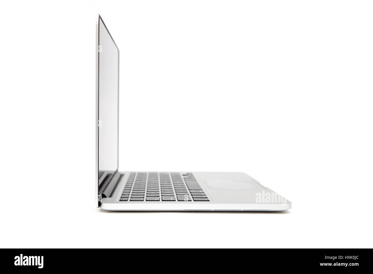 Side view of laptop with blank screen isolated on white background ...