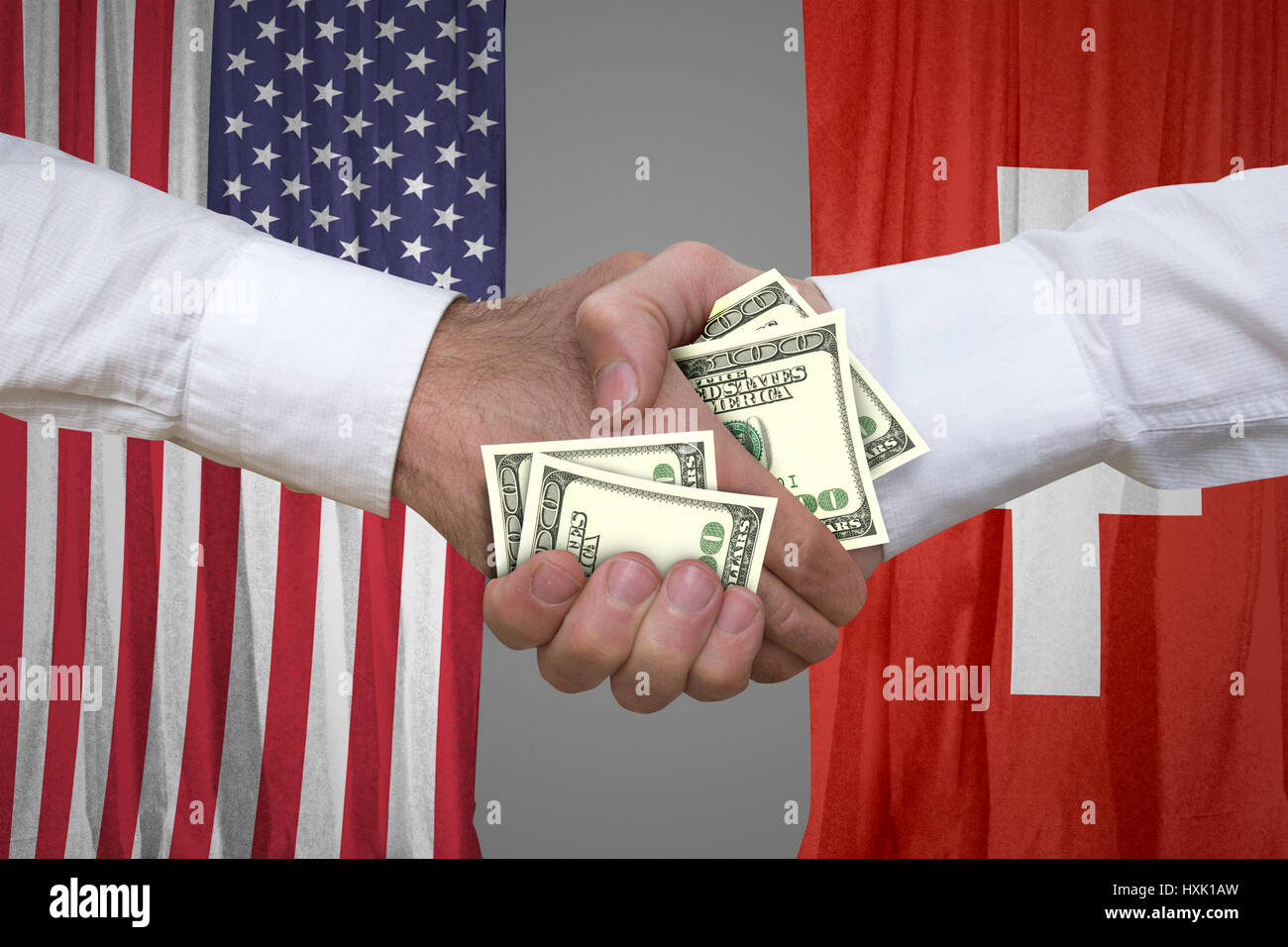 100 dollar bills handshake with USA and Switzerland's flags background