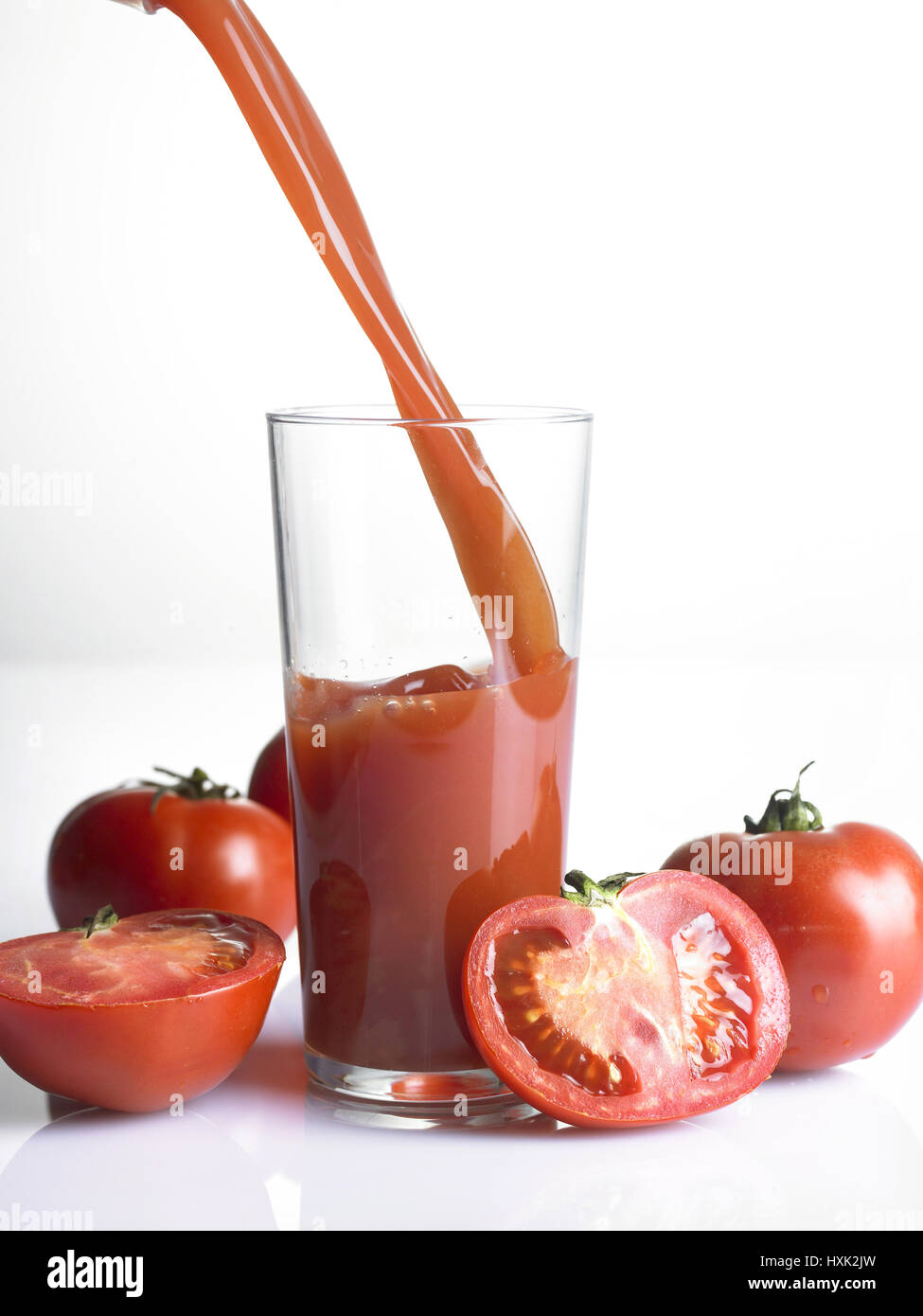 Pouring tomato juice hi-res stock photography and images - Alamy