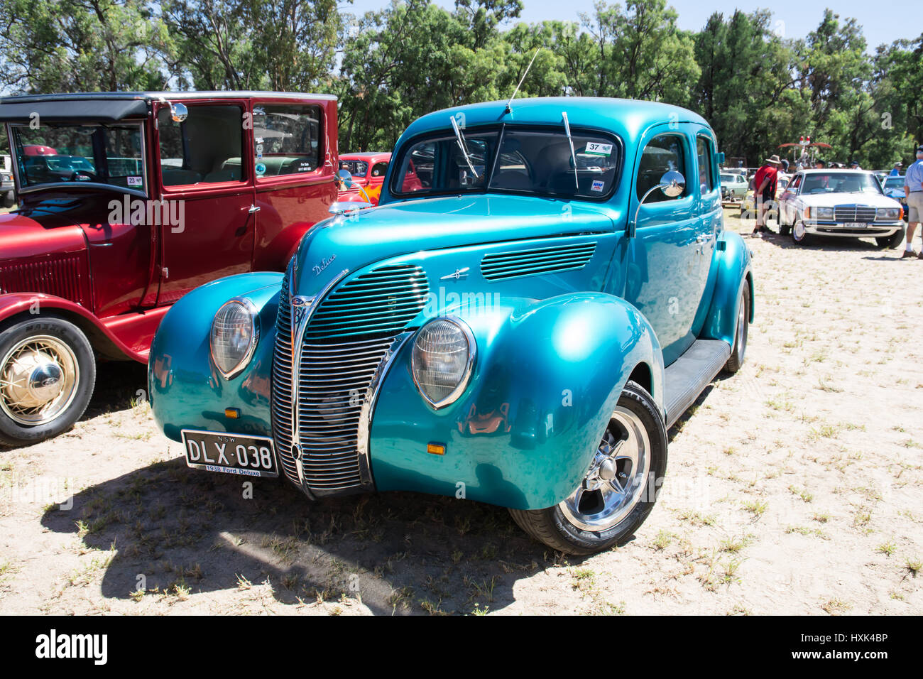 A Turquoise colored 1938 Ford Deluxe V8 car. Stock Photo