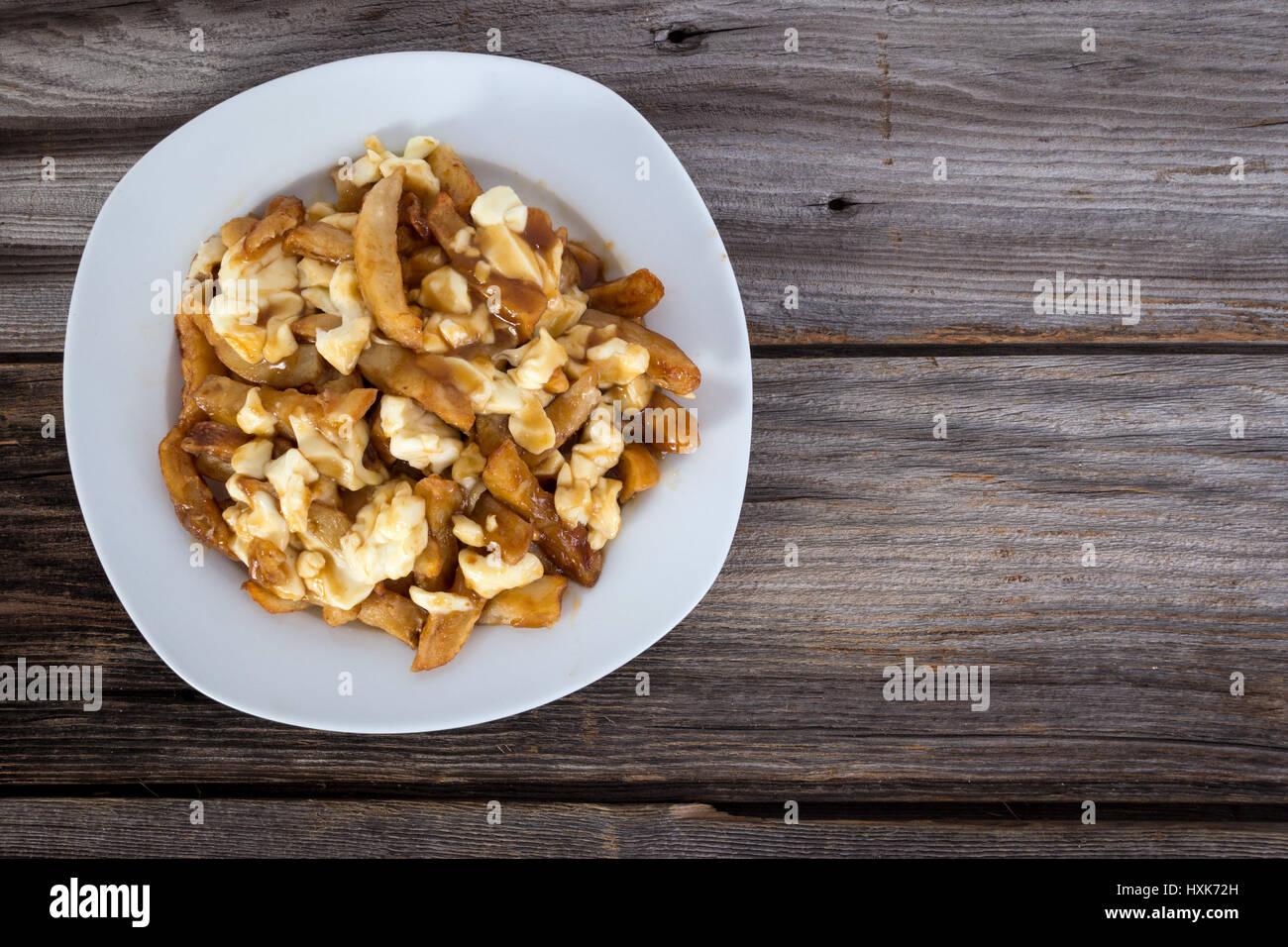 Poutine quebec meal with french fries, gravy and cheese curds Stock