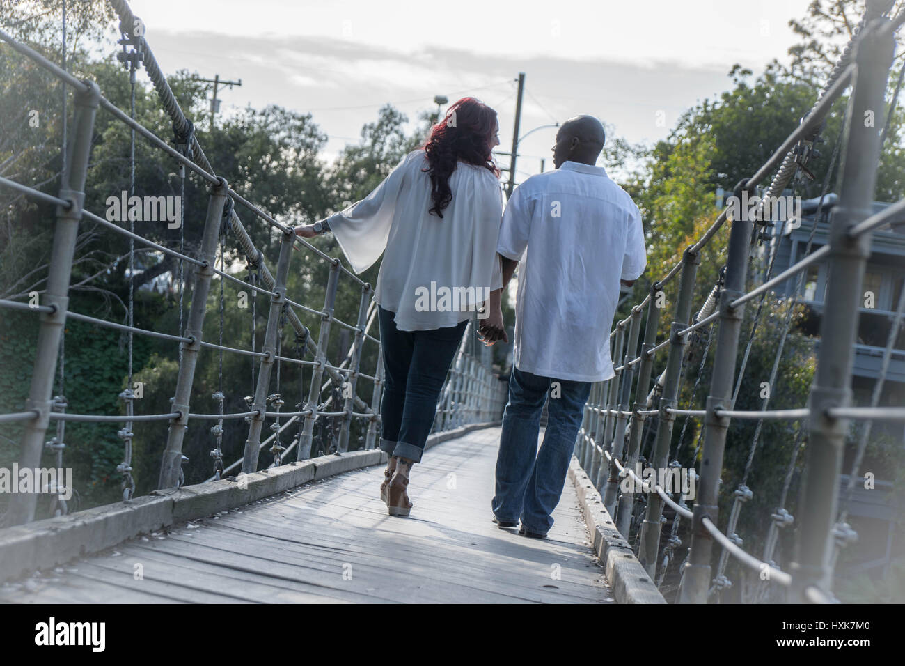 couple on bridge Stock Photo - Alamy