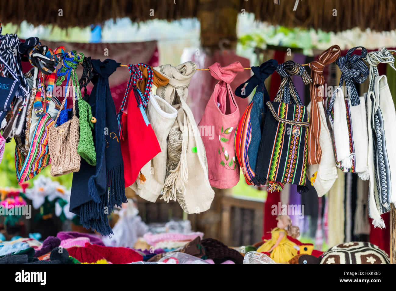 Colorful hand-made tote bags for sale at a souvenir shop in Northern Peru. Stock Photo