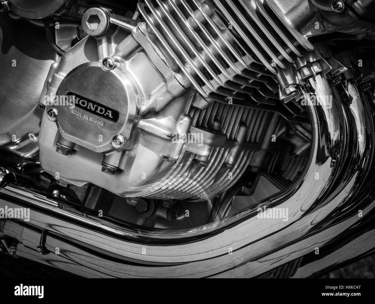 Monochrome details of a Chrome Plated classic Honda Motorcycle engine, which has been fully restored to show condition Stock Photo