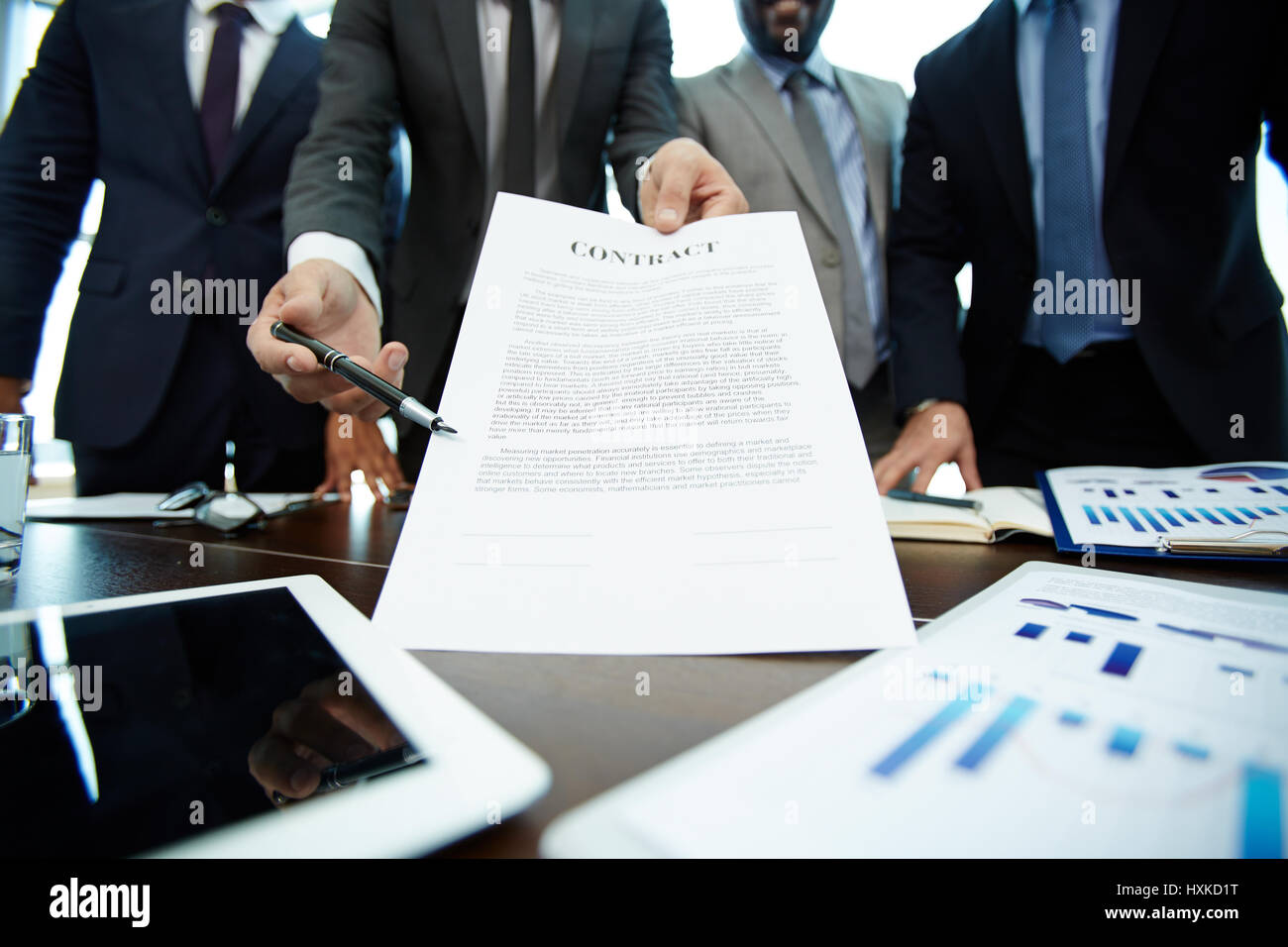 Inducing Business Partner to Sign Contract Stock Photo
