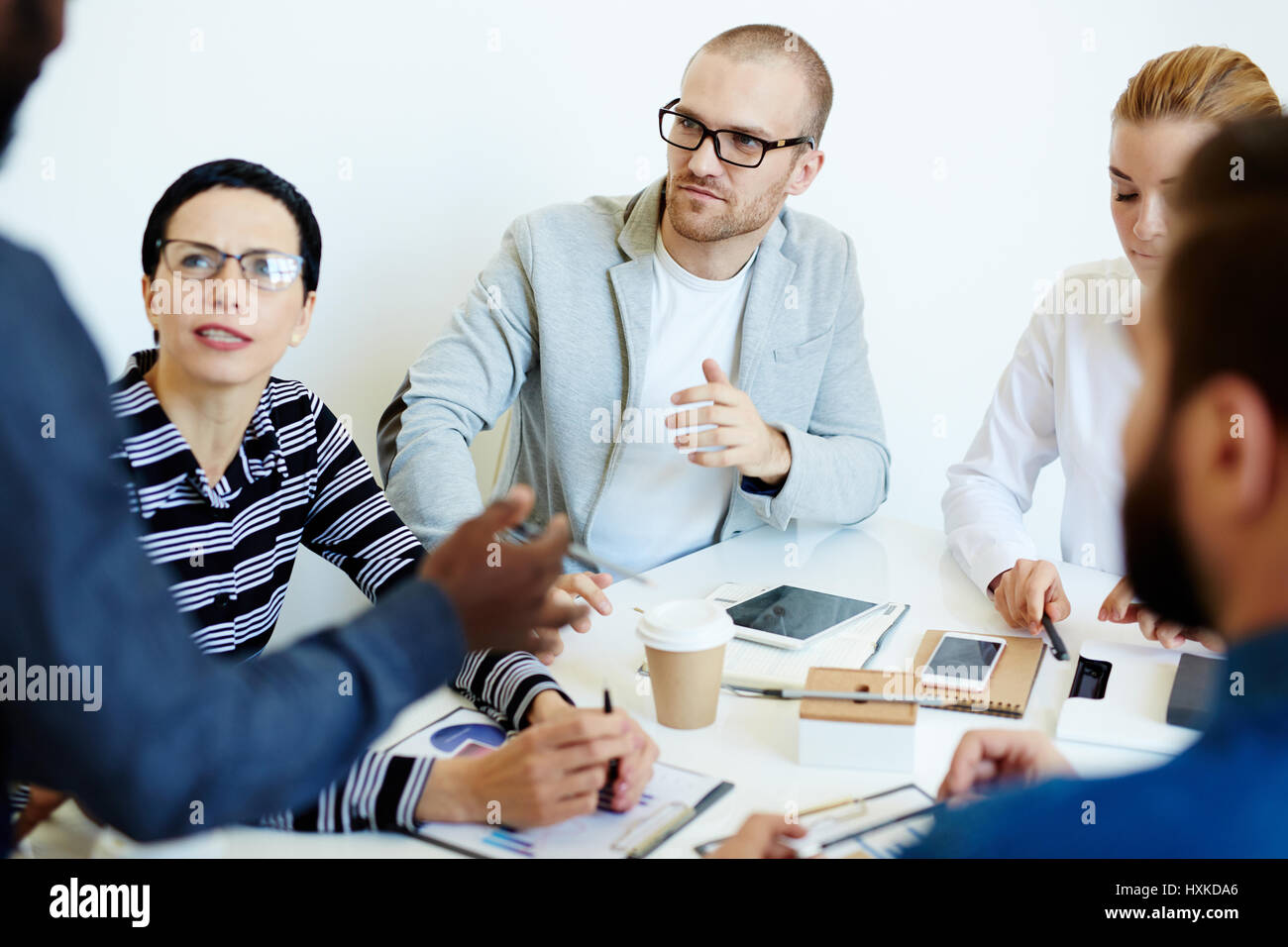 Programmers brainstorming in boardroom Stock Photo - Alamy