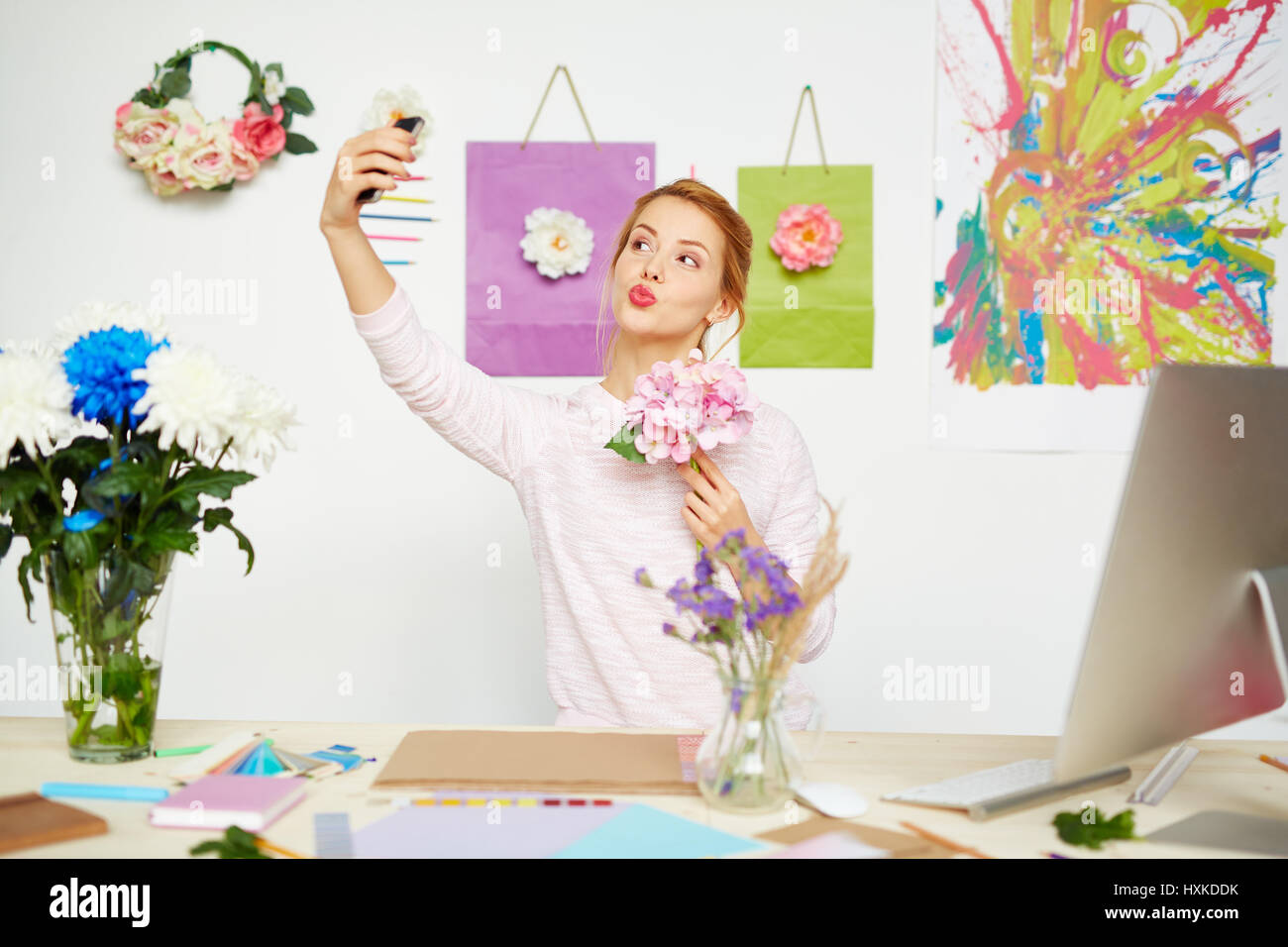 Creative florist taking selfie Stock Photo