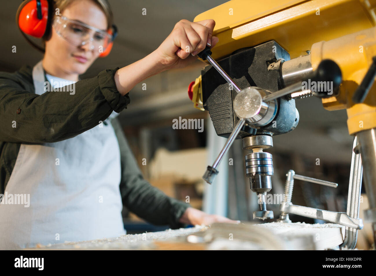 Female operator of drill press Stock Photo Alamy