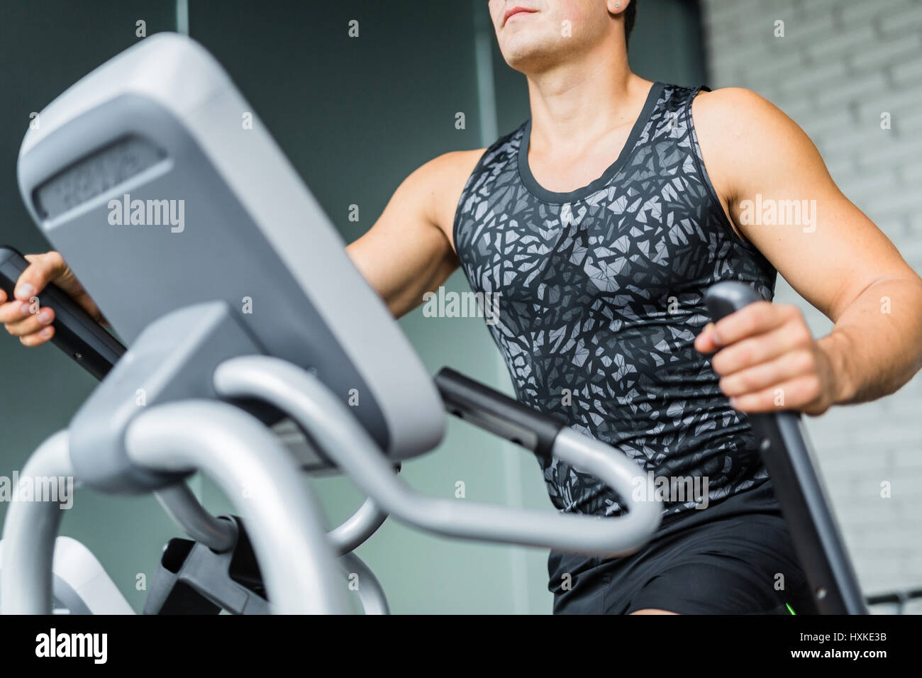 Fit Man Using Machines in Gym Workout Stock Photo Alamy