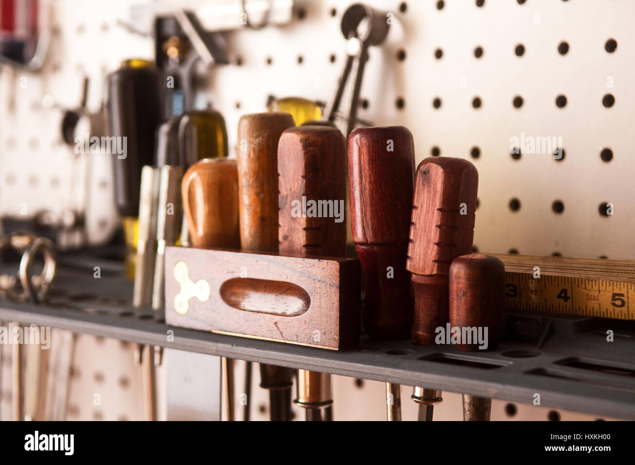 screwdriver set and tools with pegboard. Vintage wooden tools.