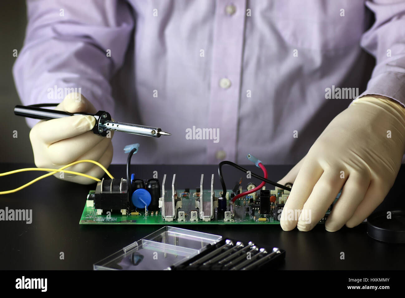 chip soldering man hands Stock Photo Alamy