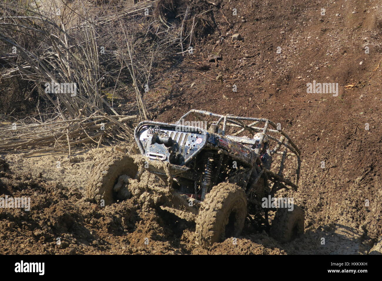 The fourwheel drive got stuck in muddy trench while driving uphill at