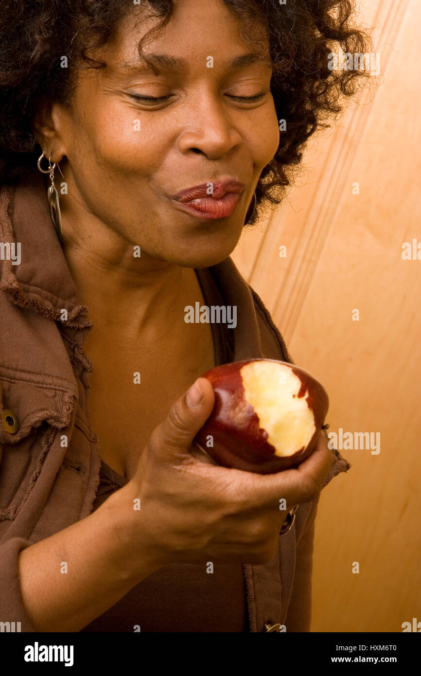Portrait of a happy African American woman smiling at home Stock Photo ...