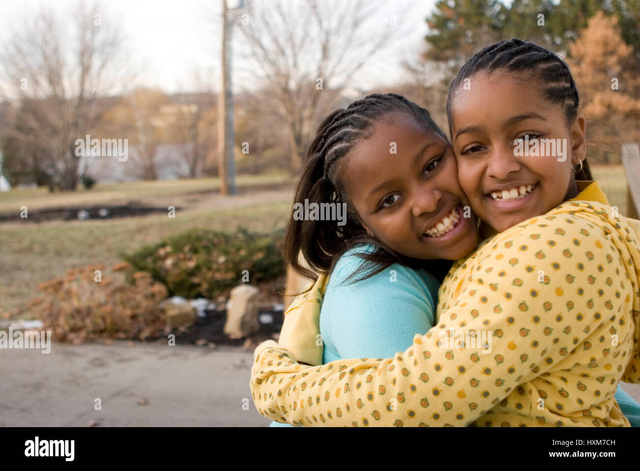African American sisters and best friends smiling and laughing Stock Photo Alamy