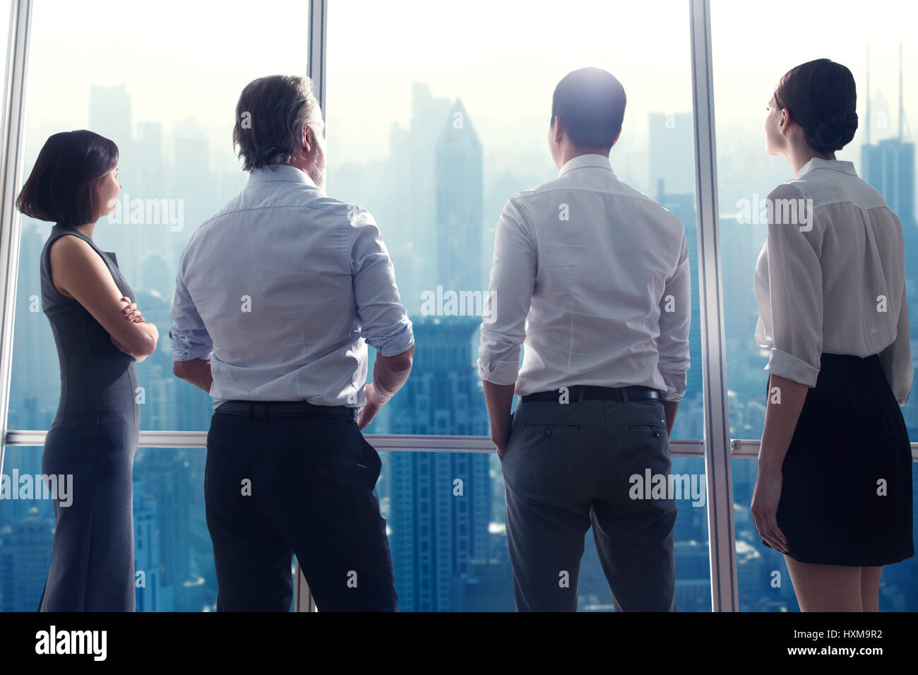 Business team standing side by side Stock Photo - Alamy