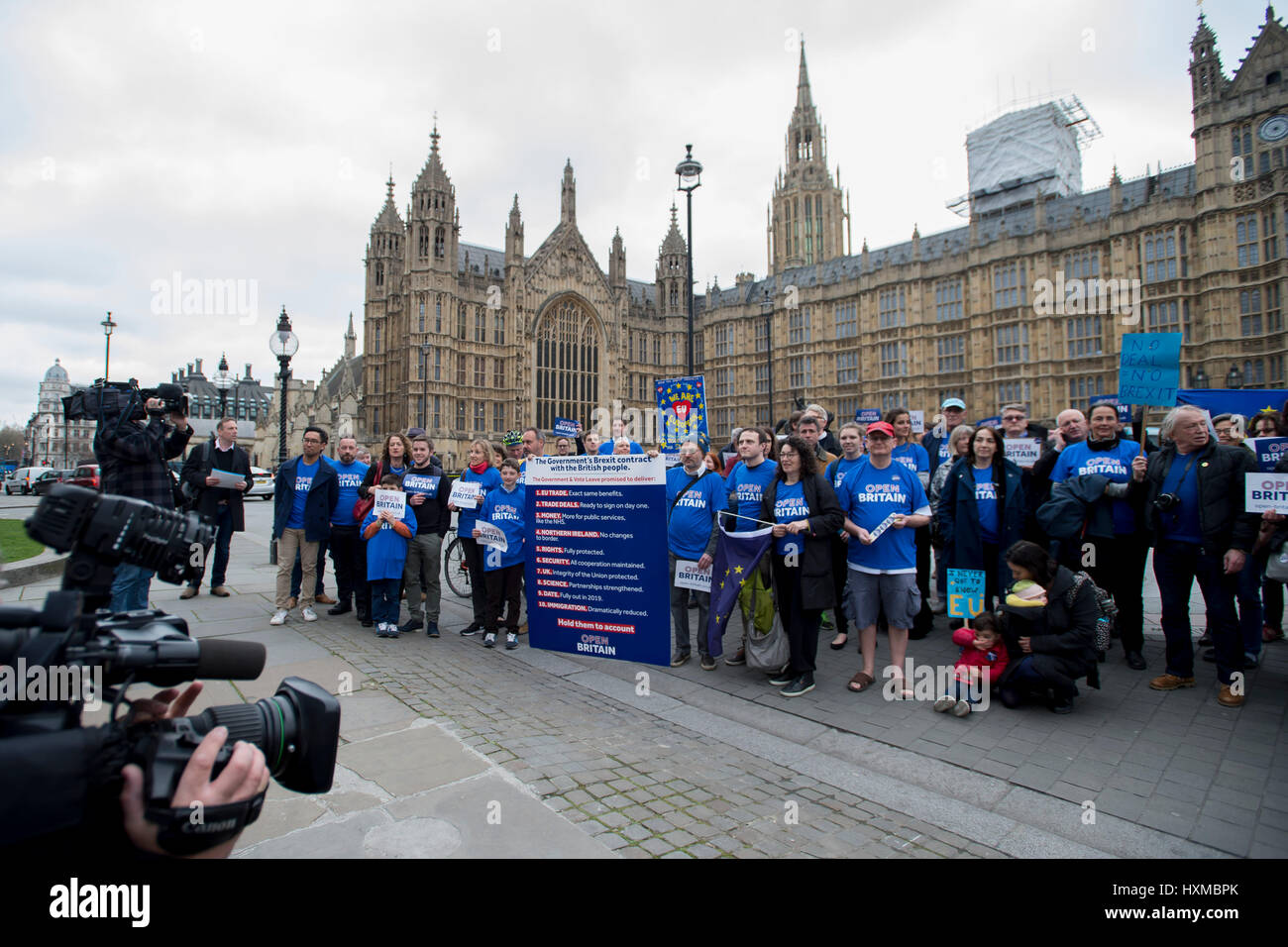 People from Open Britain, which campaigns for a soft Brexit in Parliament Square, London after the Prime Minister Theresa May signed a letter to trigger Article 50 that starts the formal exit process by the UK from the European Union. Stock Photo