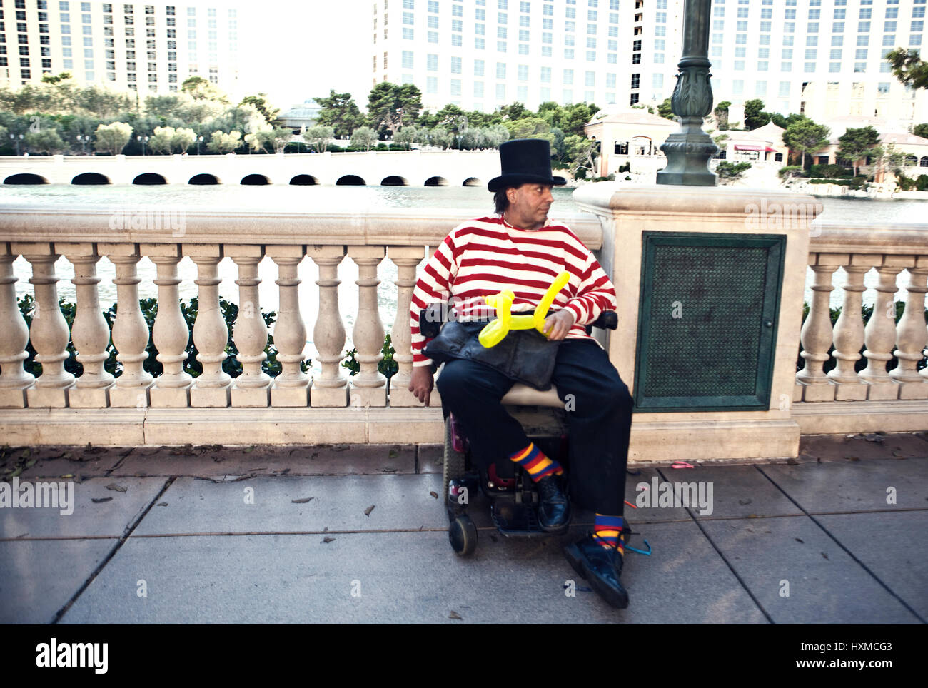 A comic performer in a wheelchair entertaining people on a street in Las Vegas, United States of America. Stock Photo