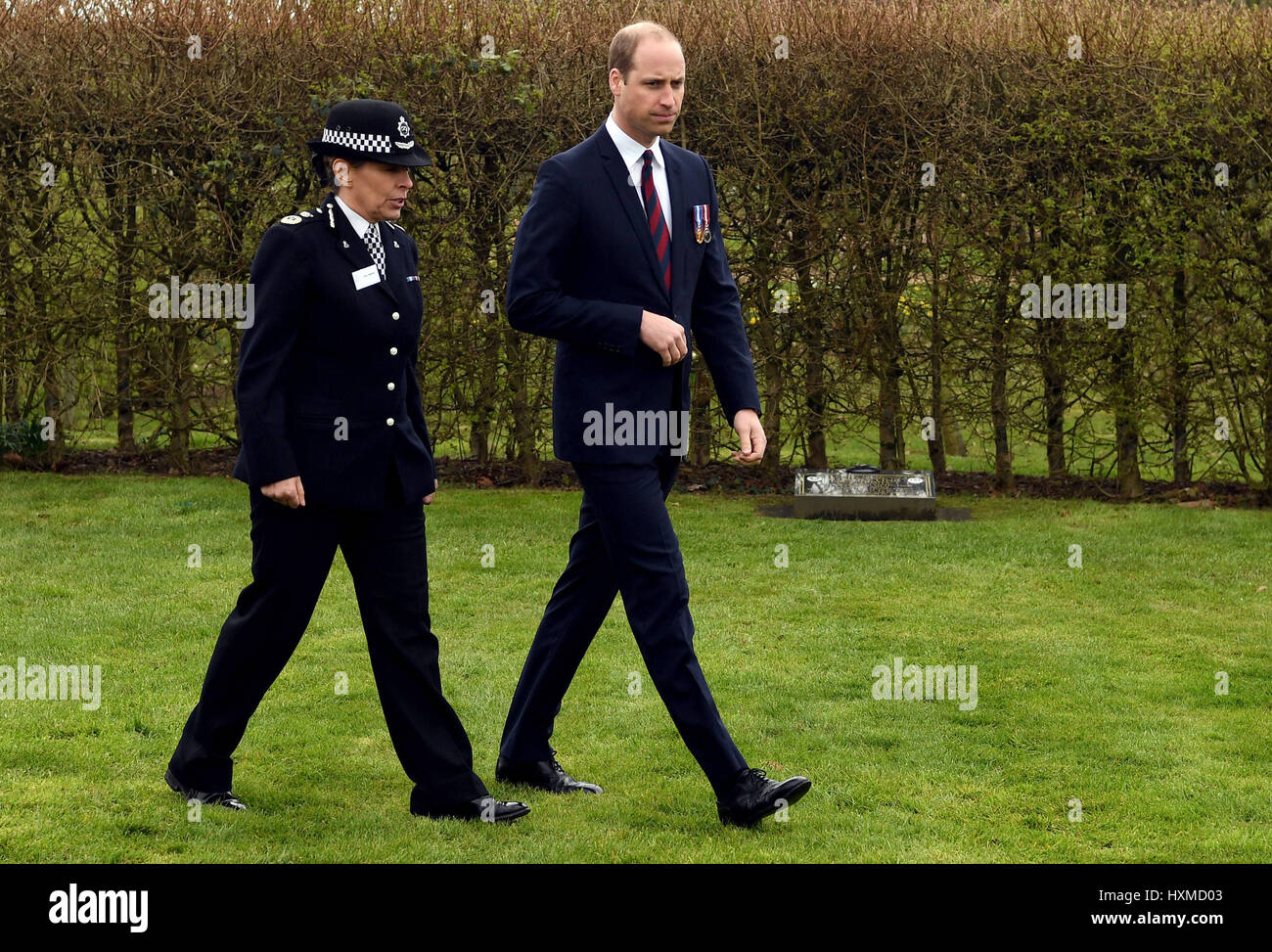 The Duke of Cambridge walks with Staffordshire Police Chief Constable Jane Sawyers, after laying a wreath at the Police memorial, at the National Arboretum in Alrewas, Staffordshire. Stock Photo