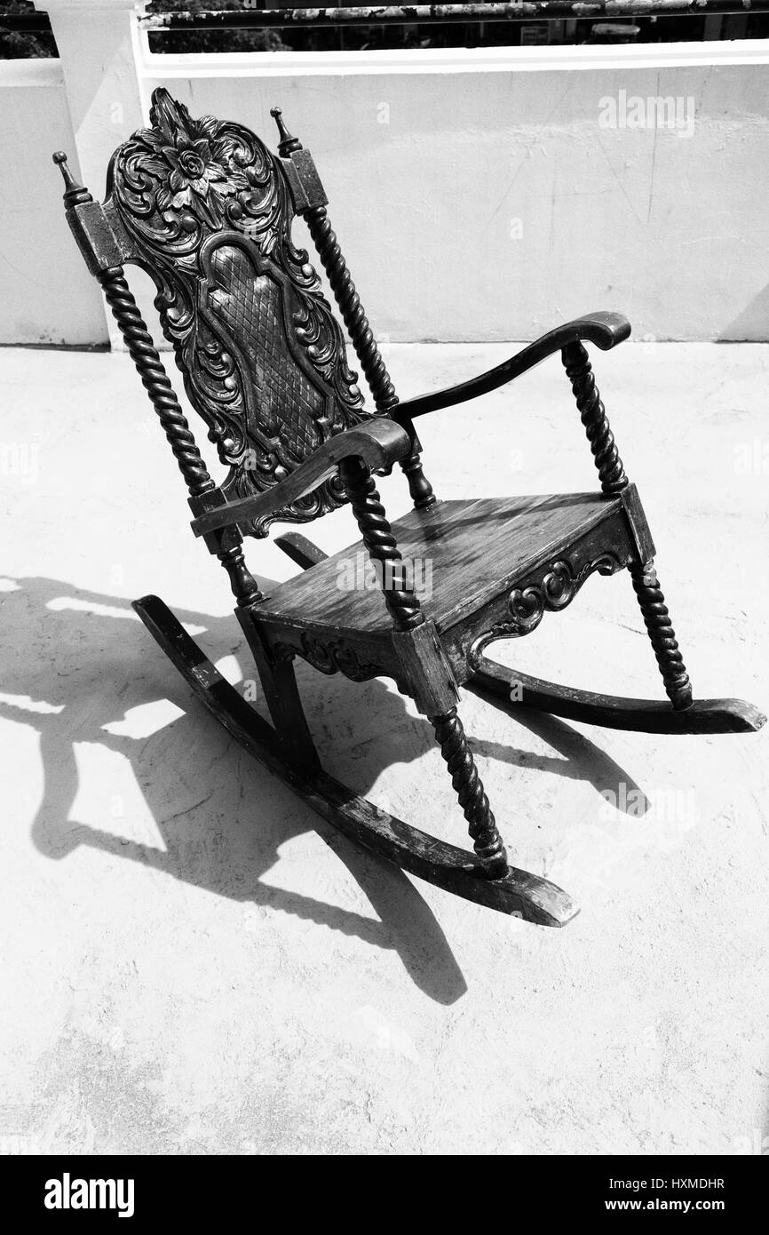 in philippines old dirty terrace whith rocking chair empty Stock Photo