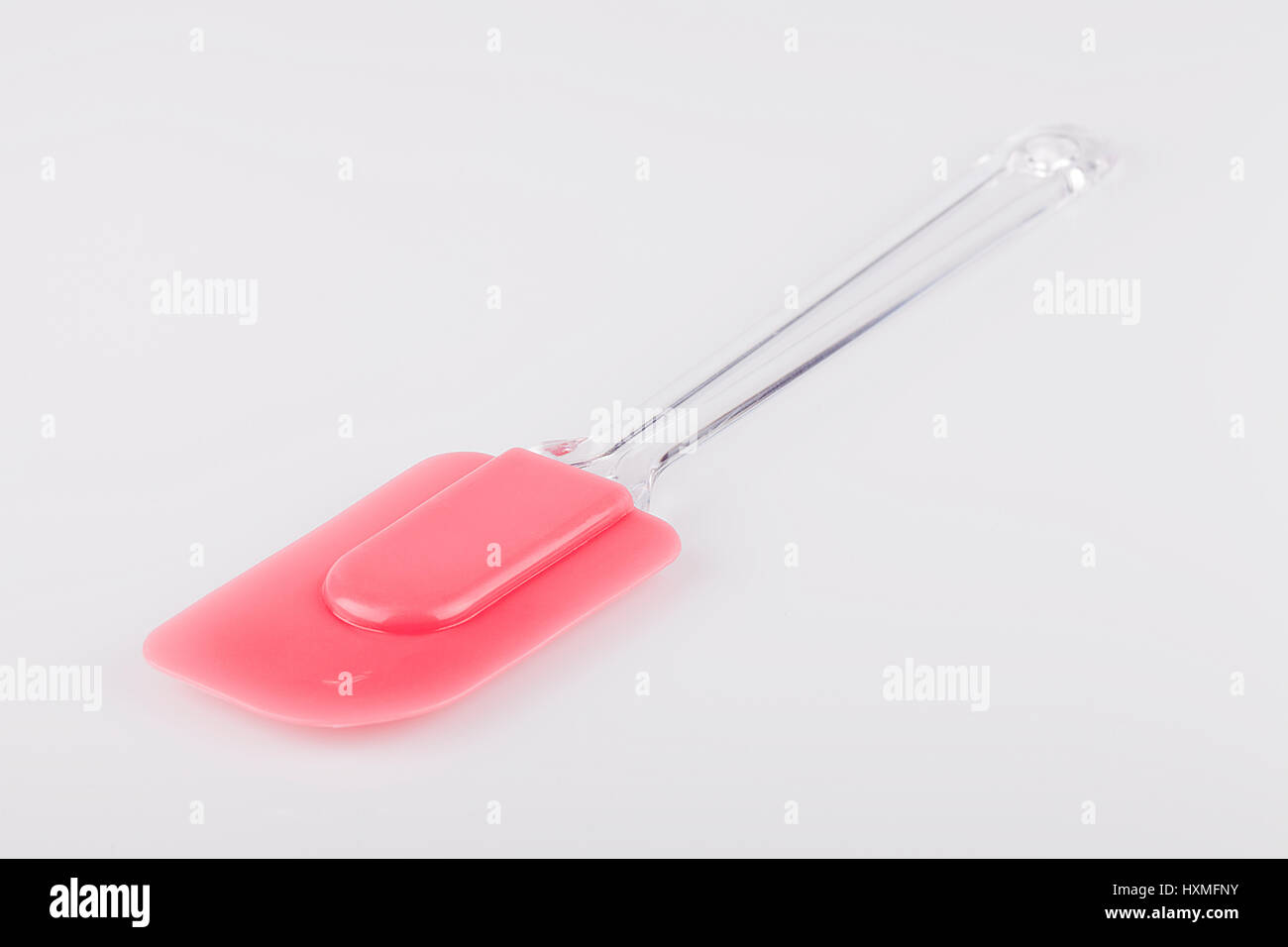 Pink spatula isolated on white background Stock Photo Alamy