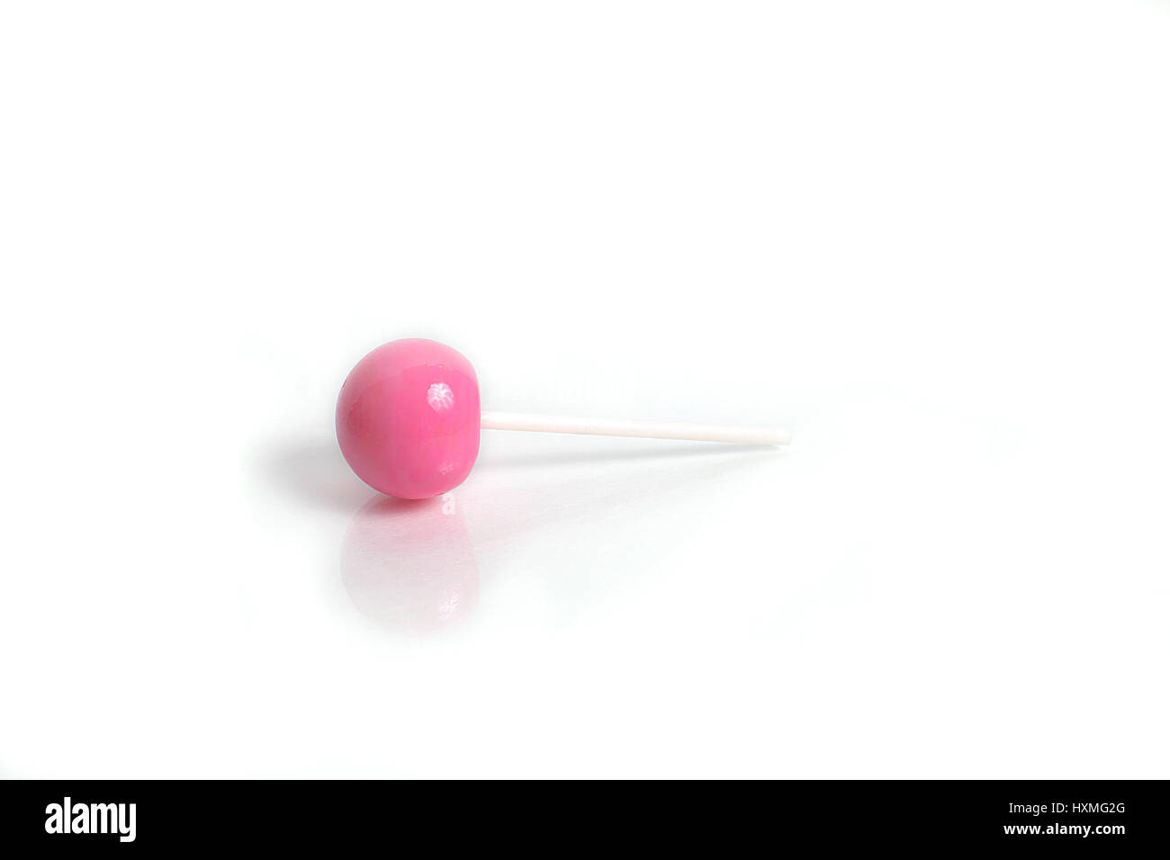 Pink lollipop isolated on white background Stock Photo - Alamy