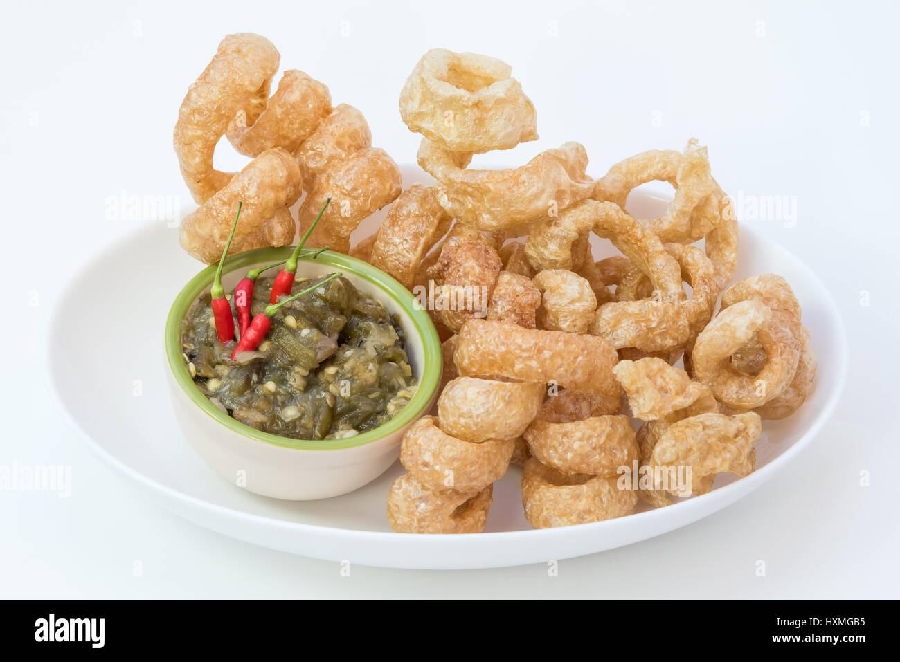Fried pork rinds with green chili dip(Nam Prik Num) Local food in