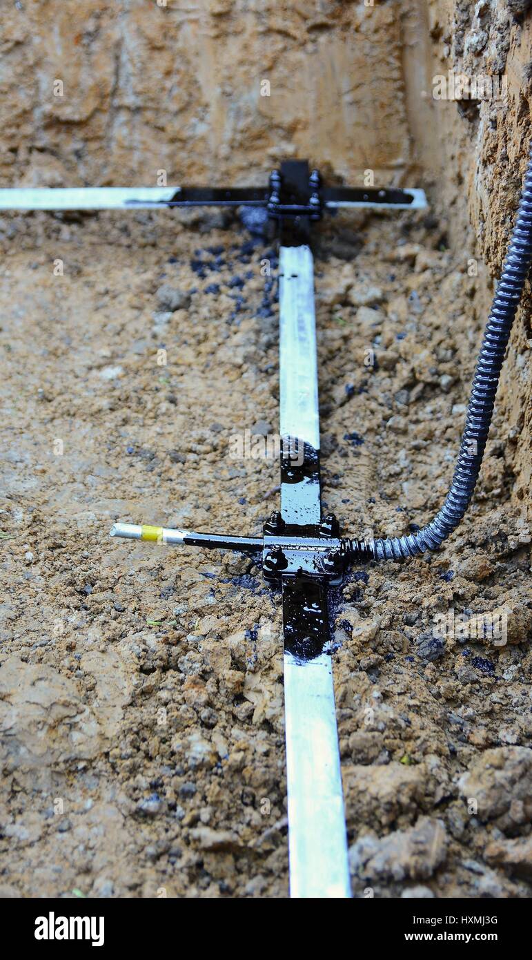 Galvanized Lightning Conductor Strip Put in a House Foundation. Stock Photo