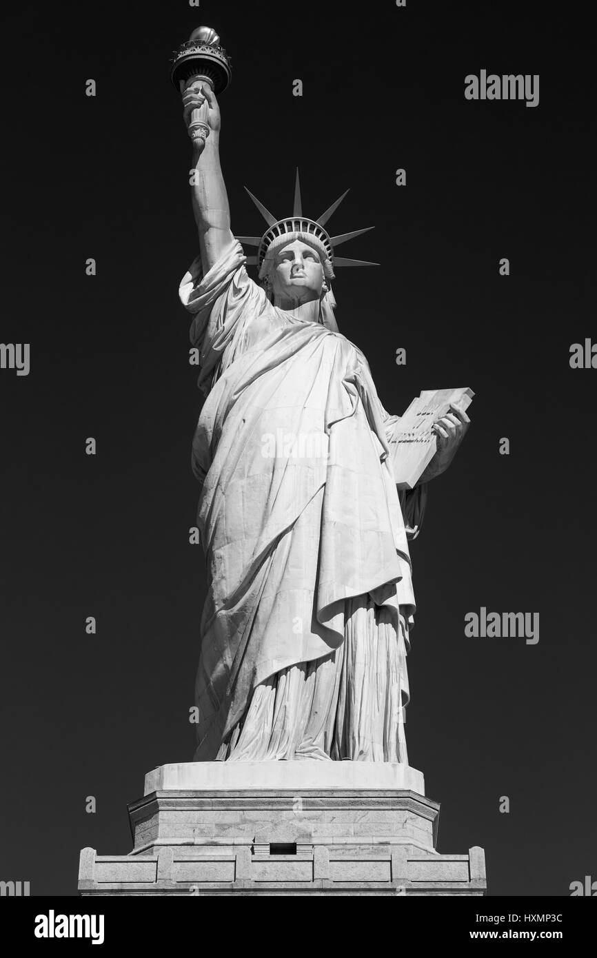 Statue of Liberty, black and white, front view, black sky in New York Stock Photo