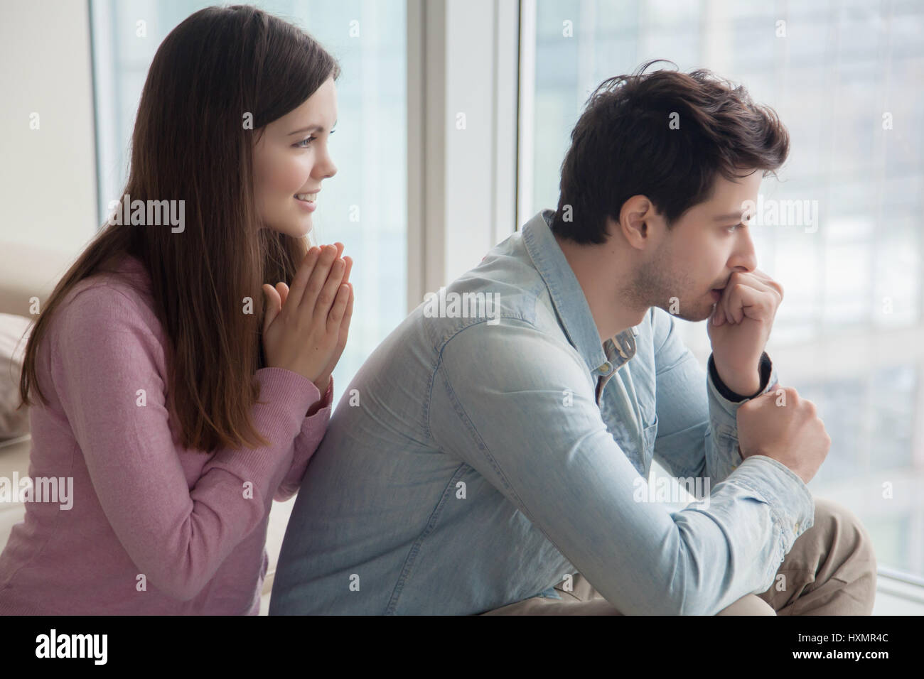 Regretful boy asking forgiveness hi-res stock photography and images ...