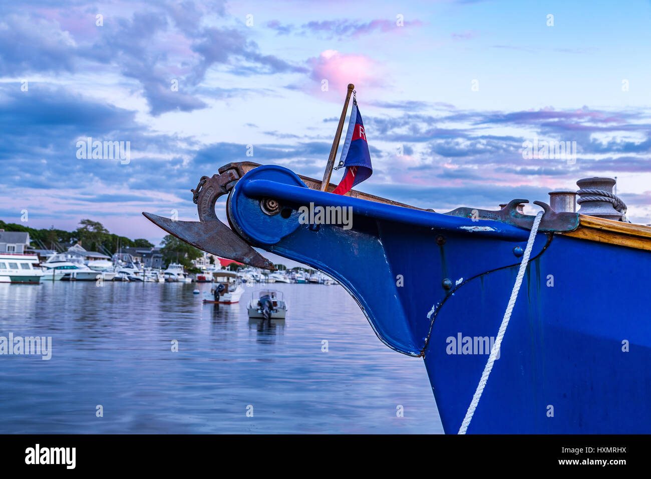 A boat anchor on a boat moored in Falmouth Harbor on Cape Cod, Massachusetts. Stock Photo