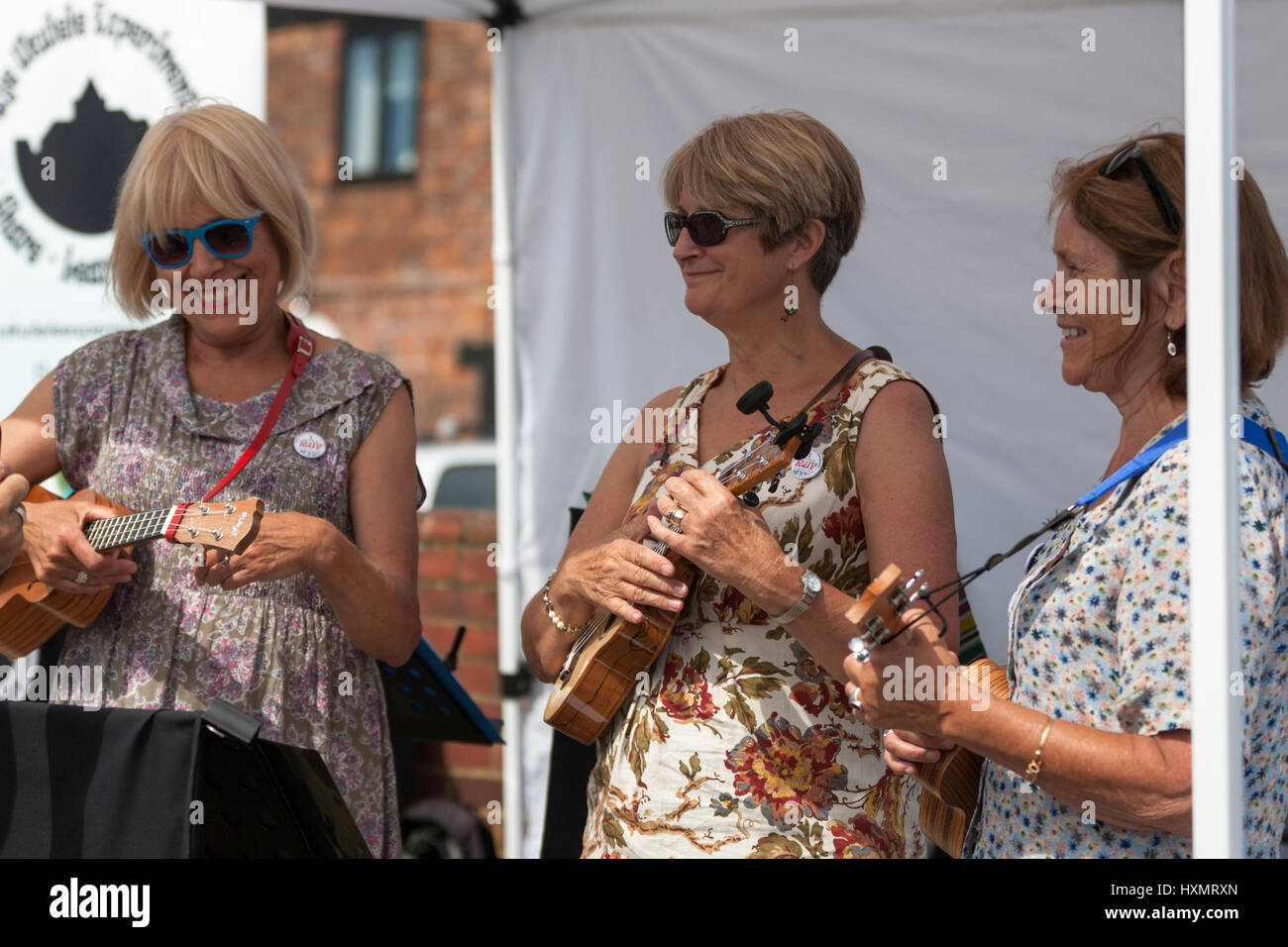 A trio of women ukulele players from the Rye Ukulele Experiment. East