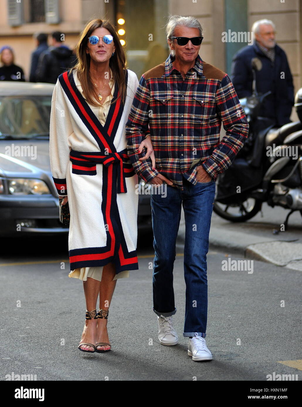 Anna dello Russo and Angelo Gioia take a stroll through downtown Milan, Italy after attending a fashion week show  Featuring: Anna dello Russo, Angelo Gioia Where: Milan, Italy When: 25 Feb 2017 Credit: IPA/WENN.com  **Only available for publication in UK, USA, Germany, Austria, Switzerland** Stock Photo