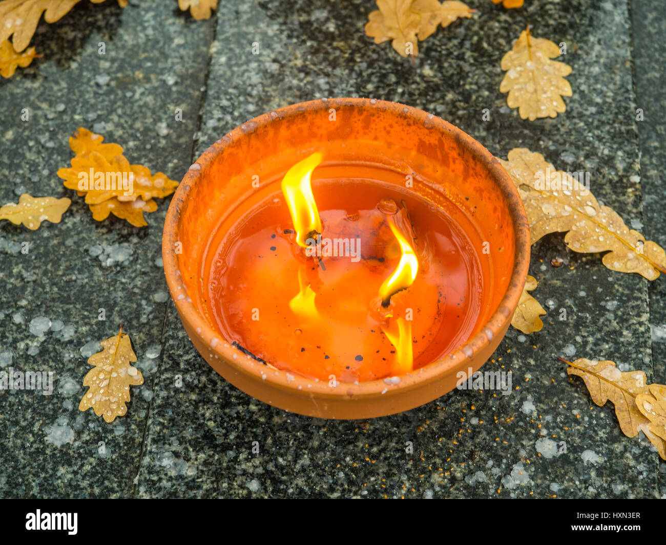 The cemetery torch burns with a bright light Stock Photo Alamy