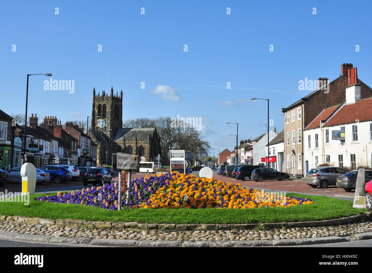 Town centre road junction with All Saints Church in the background, Northallerton, North Yorkshire, England, UK Stock Photo