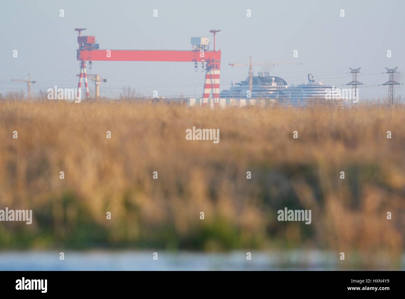 Port of Saint Nazaire seen from the marshes of La Grande Briere Natural Park Stock Photo