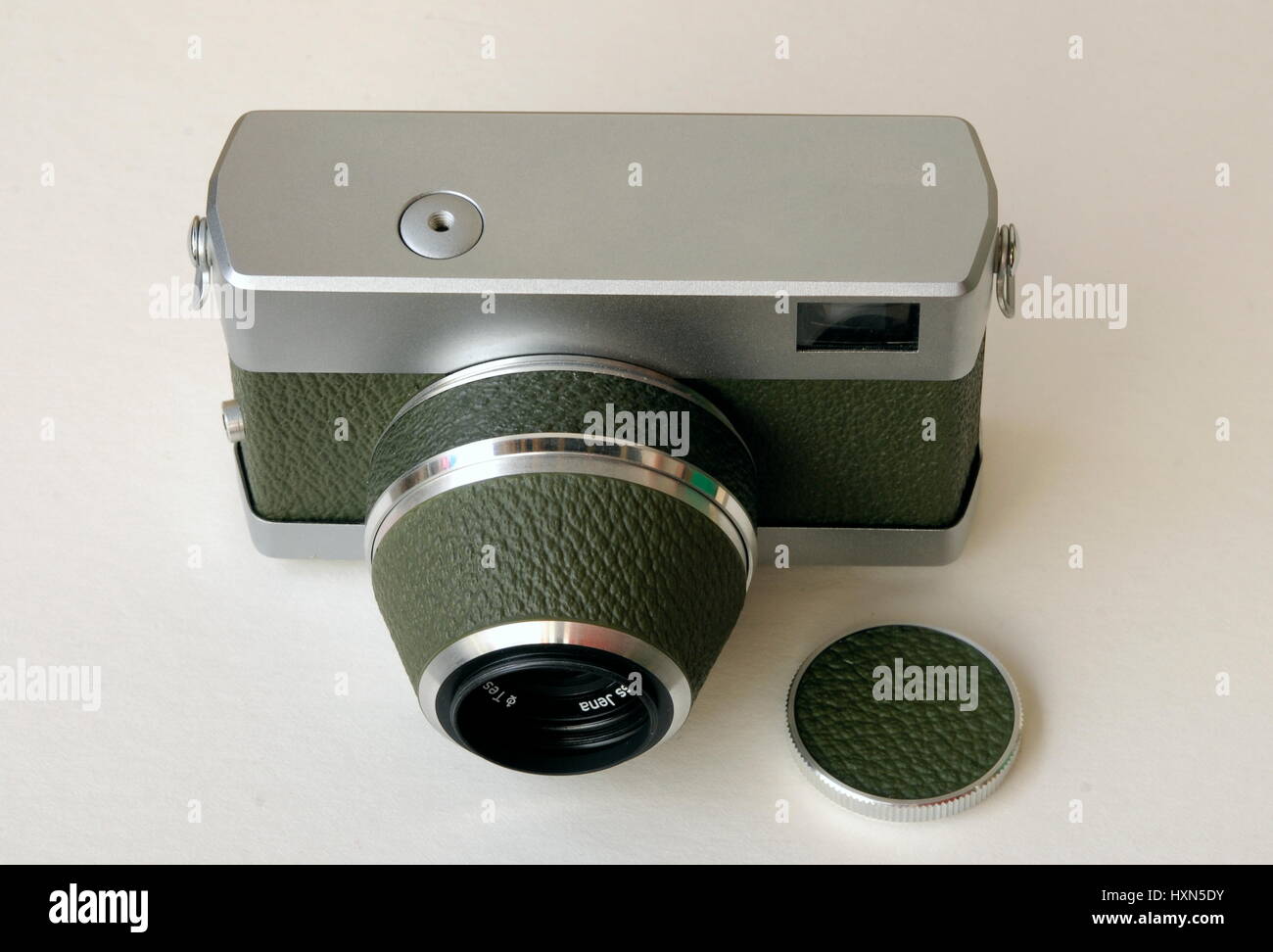 AJAXNETPHOTO. UNITED KINGDOM. - EAST GERMAN CAMERA - ORIGINAL WERRA 1 35MM FORMAT ANALOG FILM CAMERA WITH OLIVE GREEN LEATHERETTE COVERING MADE BY CARL ZEISS JENA SHOWN HERE WITH PROTECTIVE LENS BARREL COVER FITTED AND LENS CAP. PHOTO:JONATHAN EASTLAND/AJAX REF:D122405 2400 Stock Photo