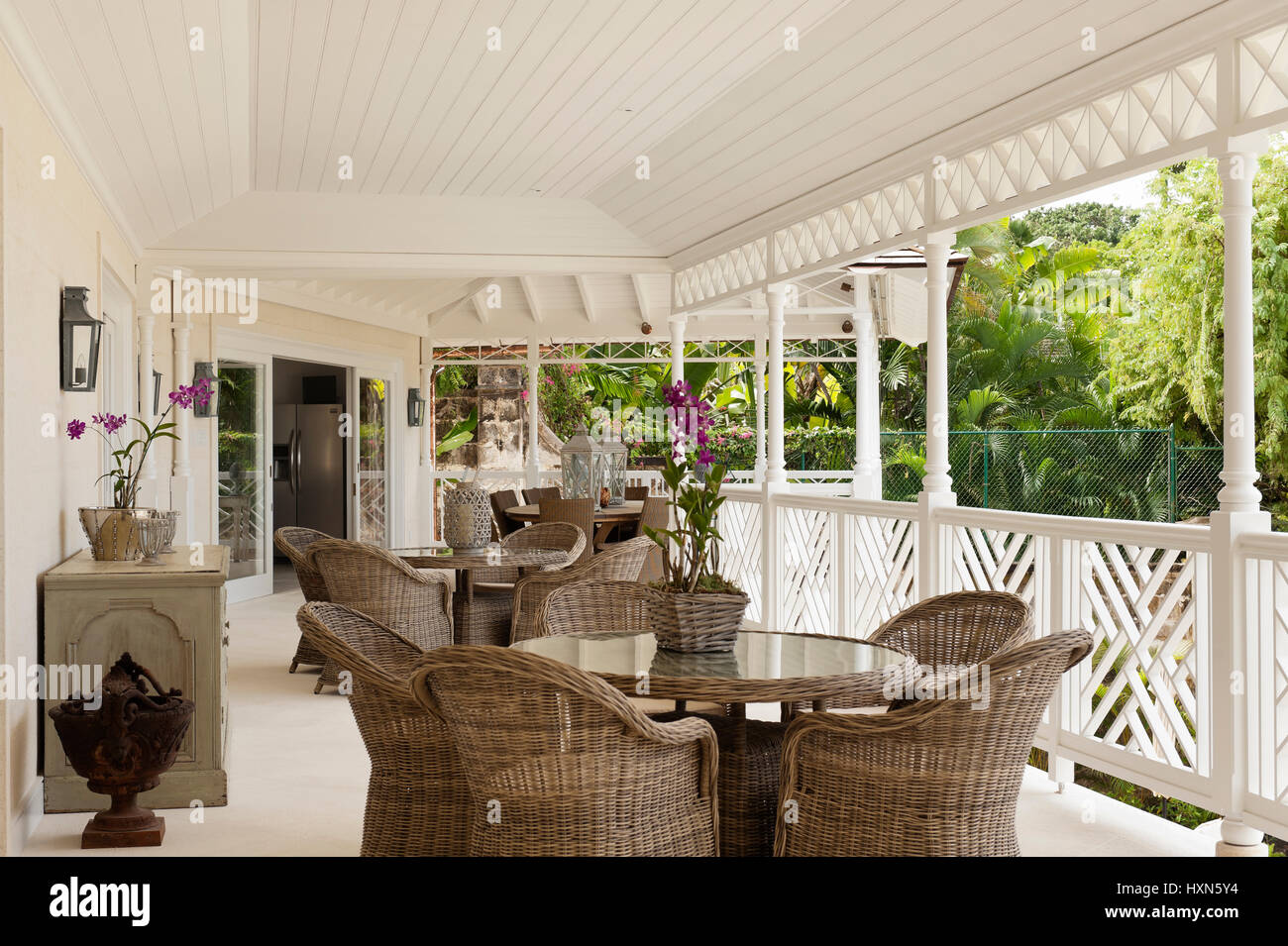 Outdoor seating on veranda of villa Stock Photo Alamy