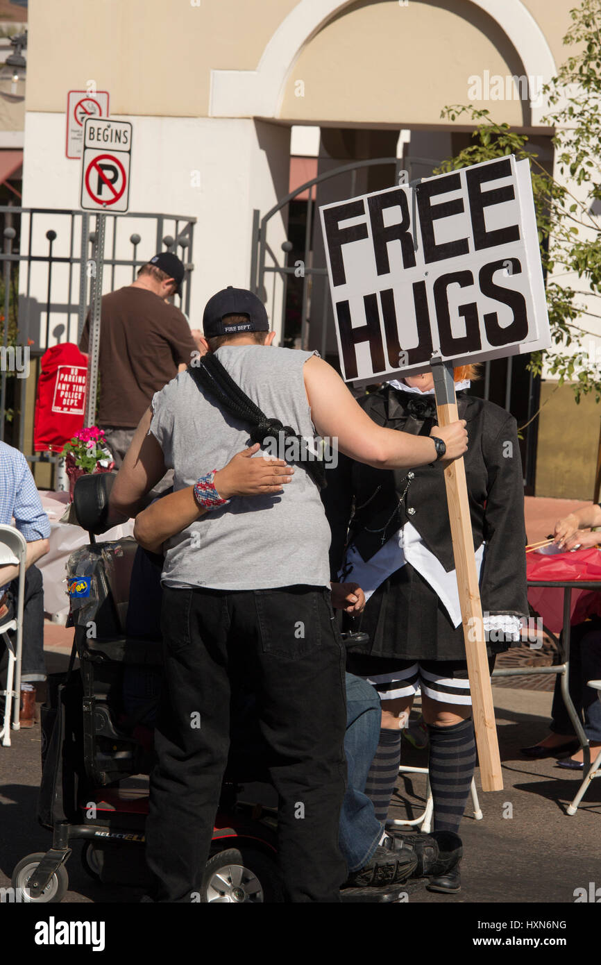 Man offering free  hugs to spectators at 2014 Arizona Matsuri Japanese Cultural Festival in Down Town Phoenix, Arizona, USA Stock Photo