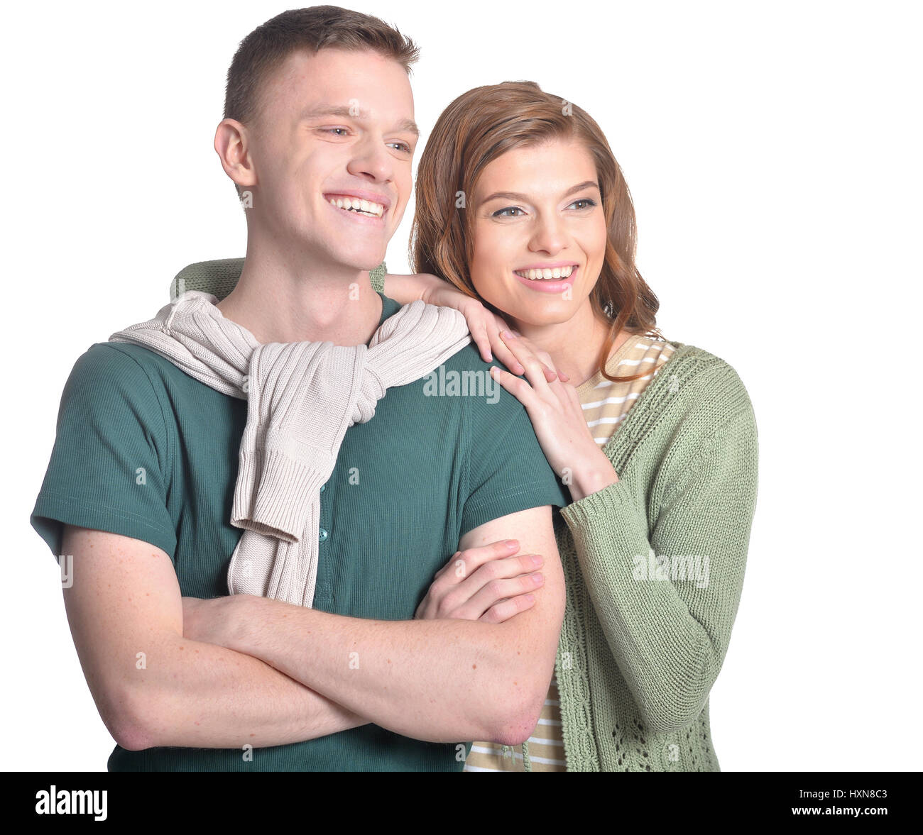 Beautiful young couple on a white background Stock Photo - Alamy